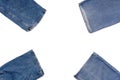 Various pieces of blue jeans isolated on a white background. The combination of fabric elements and empty space. Ready for Royalty Free Stock Photo