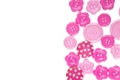 Various pink sewing buttons isolated on white background Royalty Free Stock Photo