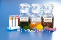 Various plant extract in bottles and homeopathic medication Royalty Free Stock Photo