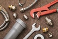 Various plumbing tools for connecting faucets and sewers, top view Royalty Free Stock Photo