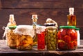 Various preserved food on wooden table