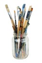 Various professional paint brushes in the transparent jar Royalty Free Stock Photo