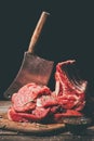 Various raw meat and cleaver Royalty Free Stock Photo