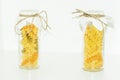 The various raw pasta in a glass jar Royalty Free Stock Photo