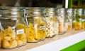 Various pasta selection in labeled jars Royalty Free Stock Photo