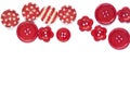 Various red sewing buttons isolated on background Royalty Free Stock Photo