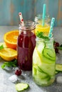 Various refreshments drinks - detox cucumber water, cherry juice and orange juice