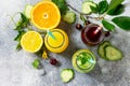 Various refreshments drinks - detox cucumber water, cherry juice and orange juice