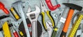 Various renovation instruments and tools on grey background. top view Royalty Free Stock Photo