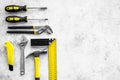 Various repair tools. Must-have for men. Equipment for building. Repair tool kit. Grey background top view pattern copy Royalty Free Stock Photo