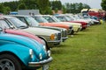 Various retro cars standing in a row in the exhibition field. Royalty Free Stock Photo