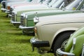 Various retro cars standing in a row in the exhibition field. Royalty Free Stock Photo