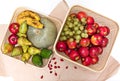 Various ripe colored fruits and vegetables are packed in wicker containers Royalty Free Stock Photo