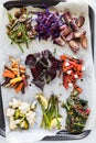 Various roasted and steamed vegetables with assorted toppings.