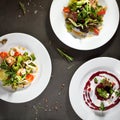 Various Salad on Black Stone Background Royalty Free Stock Photo