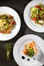 Various Salad on Black Stone Background Royalty Free Stock Photo