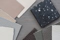 Various Samples of different colour Leather, Acrylic work surface on grey Floor Royalty Free Stock Photo