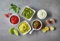 Various sauces on grey table Royalty Free Stock Photo
