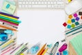 Various school supplies background with white sheet in the middle Royalty Free Stock Photo