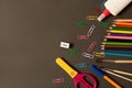 Various school supplies on the blackboard background . The concept of education. With empty space for text Royalty Free Stock Photo