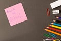 Various school supplies on the blackboard background . The concept of education. With empty space for text Royalty Free Stock Photo