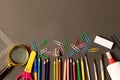 Various school supplies on the blackboard background . The concept of education. With empty space for text Royalty Free Stock Photo