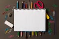 Various school supplies on the blackboard background . The concept of education. With empty space for text Royalty Free Stock Photo