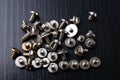 Various screws for assembling computer sets. Accessories for mechanic electronics Royalty Free Stock Photo