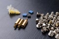 Various screws for assembling computer sets. Accessories for mechanic electronics Royalty Free Stock Photo
