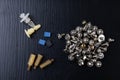Various screws for assembling computer sets. Accessories for mechanic electronics Royalty Free Stock Photo