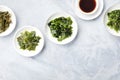 Various seaweed, sea vegetables, shot from above with copy space