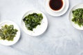 Various seaweed, sea vegetables, shot from the top with copy space