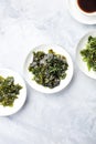 Various seaweed, sea vegetables, shot from the top on with a place for text