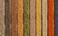 Various seeds and grains arranged in colorful stripes on the tab Royalty Free Stock Photo