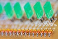 Various semiconductor or LED diodes on blurred printed circuit board detail