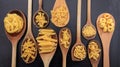 Various shapes of pasta on a black background Royalty Free Stock Photo