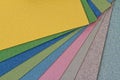 Various sheets of colored paper, as background Royalty Free Stock Photo