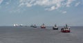 Various ships queue offshore approaching Shanghai.