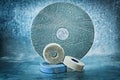 Various size abrasive discs on metalic background Royalty Free Stock Photo