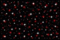 Various sizes and mixed white, red stars on a black background