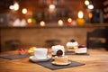 Various slices of delicious cakes on a wooden table in a coffee shop Royalty Free Stock Photo