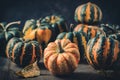 Various small pumpkins with a striped pattern