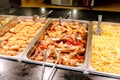 various snacks and dishes on a table at the buffet