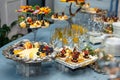 various snacks and drinks on the table at the event Royalty Free Stock Photo