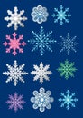 Various snowflake designs on a dark blue background