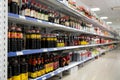 Various soy sauce bottles on shelves of Asian grocery store in Reus