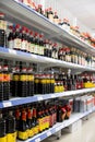 Various soy sauce bottles on shelves of Asian grocery store in Reus