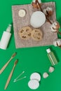 Various spa and beauty threatment products isolated on green background. natural concept