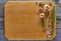 Various spices arranged on wooden copping board