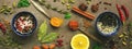 Various spices, herbs and seasonings for cooking on a dark brown background. Top view ,banner Royalty Free Stock Photo